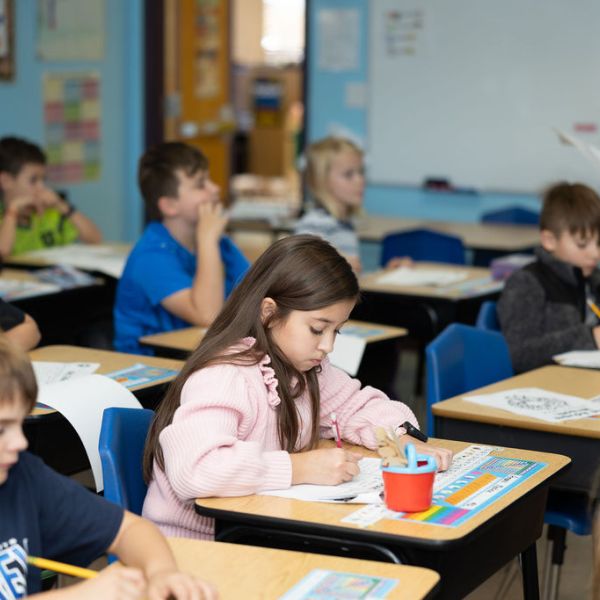 Christian elementary students learning in Albuquerque classroom